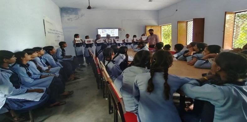 Students learning basic computer skills